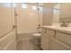 Bathroom featuring tile floors, a shower-tub, neutral paint, and white vanity at 3796 E Rakestraw Ln, Gilbert, AZ 85298