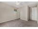 This bedroom features a ceiling fan and a window at 3796 E Rakestraw Ln, Gilbert, AZ 85298