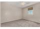 This bedroom features neutral colors and a ceiling fan at 3796 E Rakestraw Ln, Gilbert, AZ 85298