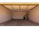 Spacious, attached two-car garage with ample room for storage or a workshop at 3796 E Rakestraw Ln, Gilbert, AZ 85298