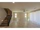 Open living area with tile flooring, staircase, recessed lighting, and plenty of natural light at 3796 E Rakestraw Ln, Gilbert, AZ 85298