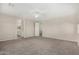 Spacious bedroom features neutral carpet, plenty of natural light, and an en-suite bathroom at 3796 E Rakestraw Ln, Gilbert, AZ 85298
