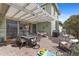Charming backyard with a covered patio, seating and barbecue, perfect for entertaining outdoors at 3881 E Galveston St, Gilbert, AZ 85295