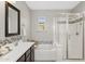 Bright bathroom featuring an enclosed shower and bathtub combo with nice vanity and mosaic tile accents at 3881 E Galveston St, Gilbert, AZ 85295