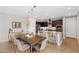 Modern eat-in kitchen features stainless steel appliances and a dining table at 3881 E Galveston St, Gilbert, AZ 85295