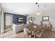 Open-concept living and dining area with modern furnishings and ample natural light at 3881 E Galveston St, Gilbert, AZ 85295