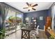 Home office with a large desk, sliding doors to a patio, and lots of light at 3881 E Galveston St, Gilbert, AZ 85295