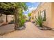 Exterior view features desert landscaping, gravel and decorative stone accents, creating an inviting outdoor space at 39017 N Habitat Cir, Cave Creek, AZ 85331