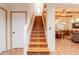 Traditional staircase featuring tile accents on the steps and open floor plan at 39017 N Habitat Cir, Cave Creek, AZ 85331