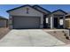 Beautiful single-story home with a two-car garage and a well-manicured, low-maintenance front yard at 3936 E San Jose St, San Tan Valley, AZ 85143