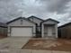 Charming single-story home with a two-car garage and low-maintenance front yard at 3936 E San Jose St, San Tan Valley, AZ 85143