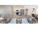 Bright kitchen features stainless appliances, granite countertops, and seating at the island at 3936 E San Jose St, San Tan Valley, AZ 85143