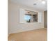 Bedroom featuring a large window with white shutters and a view to the outdoors at 40713 N Citrus Canyon Trl, Phoenix, AZ 85086
