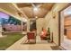 Enjoy the outdoor living with covered patio and outdoor seating area at 40713 N Citrus Canyon Trl, Phoenix, AZ 85086
