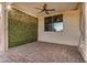 Covered patio featuring brick pavers and a green wall for added privacy and ambiance at 40713 N Citrus Canyon Trl, Phoenix, AZ 85086