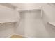 Spacious walk-in closet with ample shelving and rod space for organized storage at 40713 N Citrus Canyon Trl, Phoenix, AZ 85086