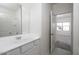 Well-lit bathroom with modern vanity and a view of the bedroom through an open doorway at 4227 E Kolin Ln, San Tan Valley, AZ 85143