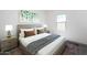 Bright bedroom featuring a decorative headboard, two side tables, a lamp, and soft neutral decor at 4227 E Kolin Ln, San Tan Valley, AZ 85143