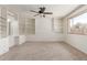 Carpeted bedroom with built-in shelving and storage at 4803 W Harmont Dr, Glendale, AZ 85302