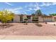 Charming single-story home showcasing desert landscaping and a well-maintained front yard at 4803 W Harmont Dr, Glendale, AZ 85302