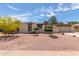 Charming single-story home showcasing desert landscaping and a well-maintained front yard at 4803 W Harmont Dr, Glendale, AZ 85302