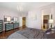 Bedroom featuring a chandelier, and hardwood floors at 5136 W Trotter Trl, Phoenix, AZ 85083