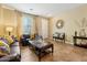 Inviting living room with tile floors, comfortable seating, and tasteful decor at 5136 W Trotter Trl, Phoenix, AZ 85083