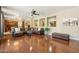 Open-concept living area with hardwood floors, recessed lighting, and stylish decor accents at 5136 W Trotter Trl, Phoenix, AZ 85083