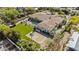 Estate featuring a private pool, spa, expansive lawn, outdoor fireplace, and a basketball court at 5615 N Invergordon Rd, Paradise Valley, AZ 85253