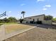Basketball court on beautiful lot featuring gravel and desert landscaping at 5615 N Invergordon Rd, Paradise Valley, AZ 85253