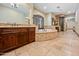 Luxurious bathroom featuring a tub, vanity, tiled floors, and walk-in shower at 5615 N Invergordon Rd, Paradise Valley, AZ 85253