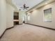 Expansive bedroom featuring a ceiling fan and built-in wet bar area at 5615 N Invergordon Rd, Paradise Valley, AZ 85253