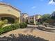 Beautiful home exterior with fountain and mature landscaping at 5615 N Invergordon Rd, Paradise Valley, AZ 85253