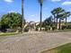 Stunning desert home featuring mature landscaping and a paver driveway at 5615 N Invergordon Rd, Paradise Valley, AZ 85253