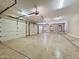 Spacious three car garage offering ample parking and storage at 5615 N Invergordon Rd, Paradise Valley, AZ 85253