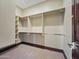 The well-organized walk-in closet is complete with custom shelving and ample hanging space at 5615 N Invergordon Rd, Paradise Valley, AZ 85253