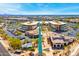Aerial view of a commercial center showing multiple office buildings, landscaped grounds, and ample parking at 5704 E Aire Libre Ave # 1246, Scottsdale, AZ 85254
