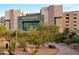 Exterior of the Mayo Clinic building with well-maintained landscaping and desert flora, offering a serene environment at 5704 E Aire Libre Ave # 1246, Scottsdale, AZ 85254