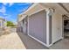 Charming home exterior with gray siding, white trim, and a tidy gravel yard at 6749 E Ellis St, Mesa, AZ 85205