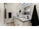 Elegant bathroom with double sinks, granite countertop, and modern fixtures at 6907 E Portland St, Scottsdale, AZ 85257