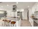 Beautiful kitchen featuring a central island, stainless steel appliances, and modern finishes at 6907 E Portland St, Scottsdale, AZ 85257