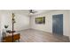 Bright living room featuring modern flooring, stylish lighting, and a sleek ceiling fan at 6907 E Portland St, Scottsdale, AZ 85257