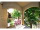 Balcony view with lush landscaping and mature trees at 6945 E Cochise E Rd # 117, Paradise Valley, AZ 85253