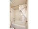 Standard bathroom with tub shower combination and neutral colored shower curtain at 6945 E Cochise E Rd # 117, Paradise Valley, AZ 85253