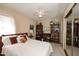 Inviting bedroom boasts a ceiling fan, and bookshelves surrounding a desk space for a relaxing retreat at 6945 E Cochise E Rd # 117, Paradise Valley, AZ 85253