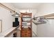 Walk-in closet featuring wood shelving at 6945 E Cochise E Rd # 117, Paradise Valley, AZ 85253