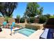Community hot tub surrounded by mature landscaping at 6945 E Cochise E Rd # 117, Paradise Valley, AZ 85253