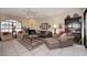 Spacious living room with tile flooring, a ceiling fan, and lots of natural light at 6945 E Cochise E Rd # 117, Paradise Valley, AZ 85253