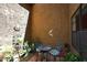 Outdoor patio with seating and desert decor at 6945 E Cochise E Rd # 117, Paradise Valley, AZ 85253