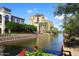 Scenic waterfront view showcases the building's prime location near the water and surrounding landscaping at 6945 E Cochise E Rd # 117, Paradise Valley, AZ 85253
